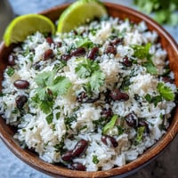 Fluffy Coconut Lime Rice with Cilantro and Black Beans, ready to serve.